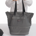 Purple | Zipsak Boost! Handbag Expands to Travel Tote